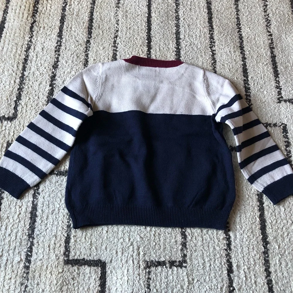Newton Trading Co tie sweater